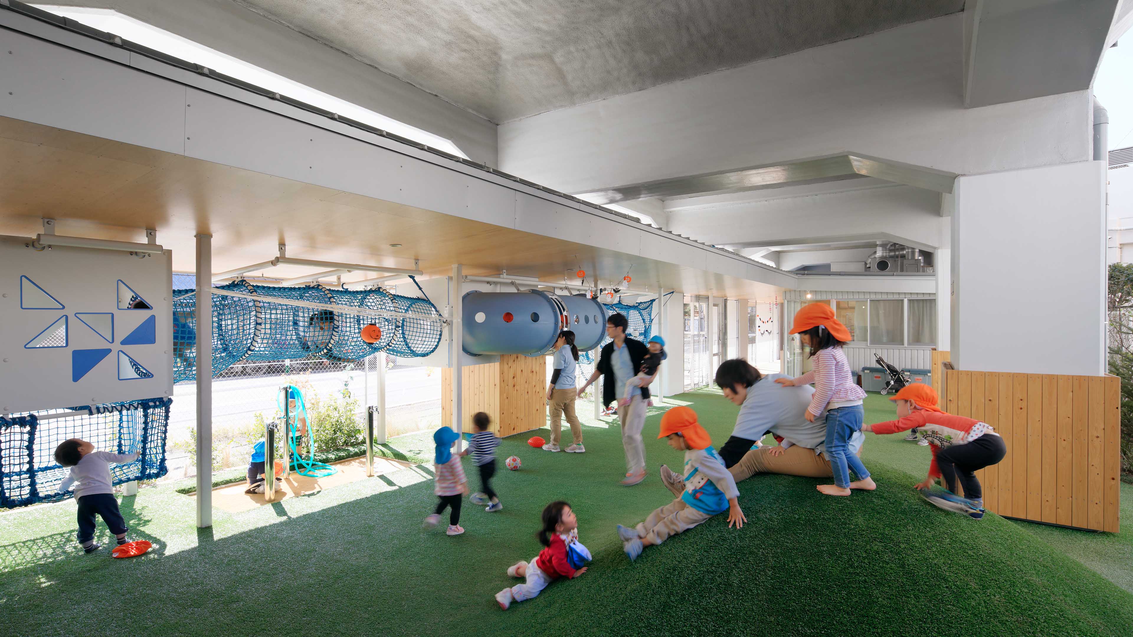 Nursery School Under Elevated Railway in Machiya