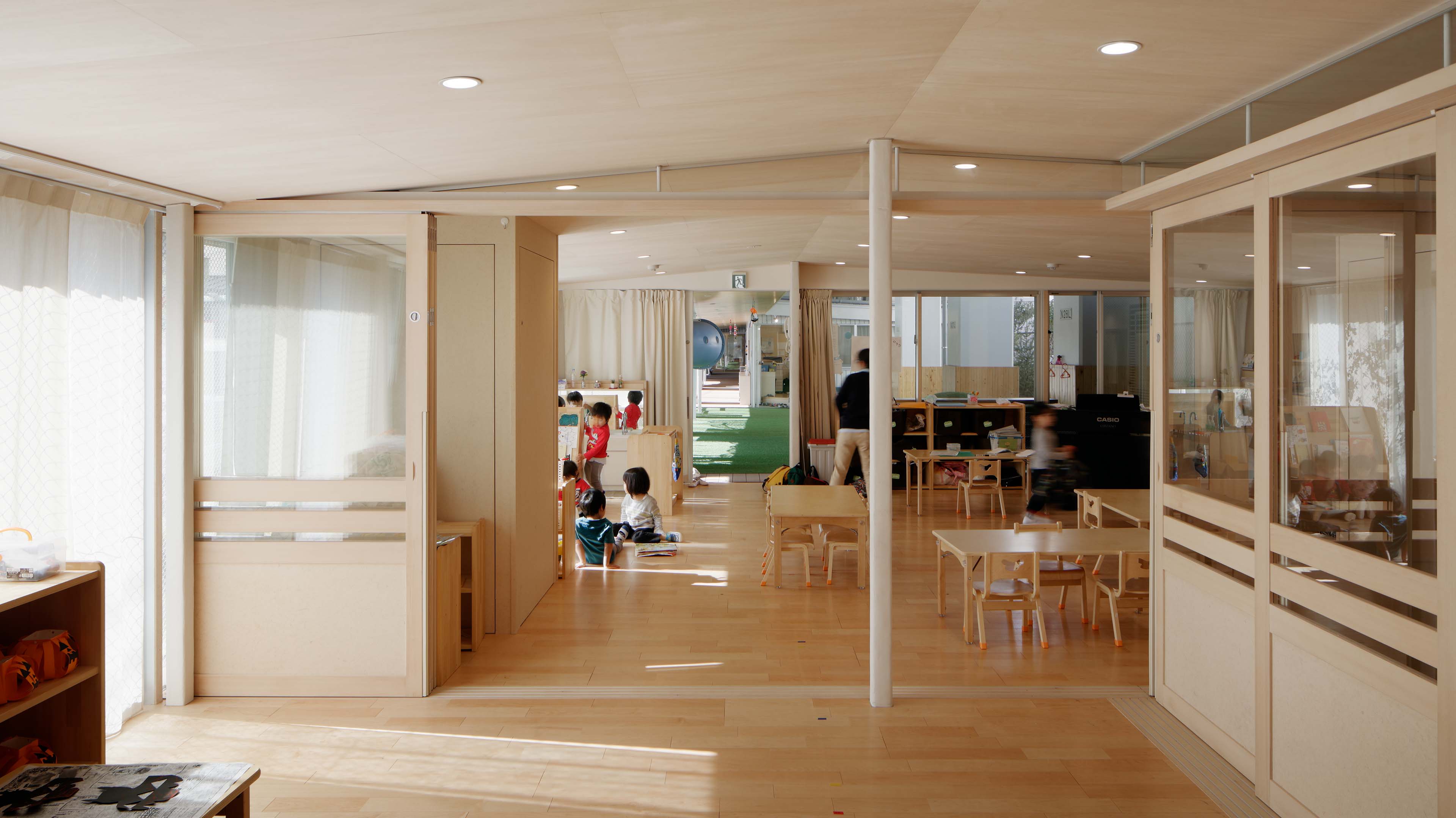 Nursery School Under Elevated Railway in Machiya