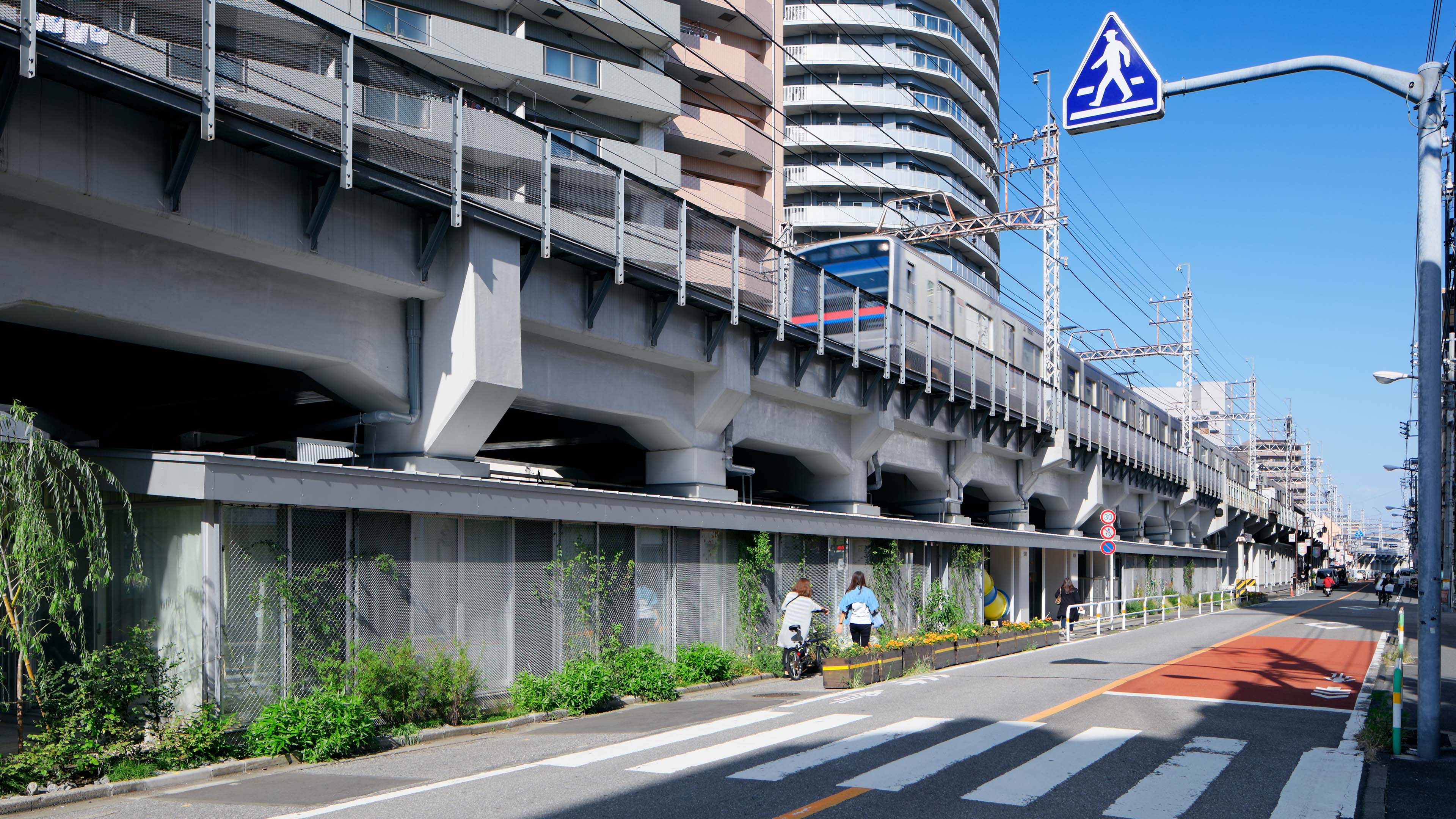 Nursery School Under Elevated Railway in Machiya