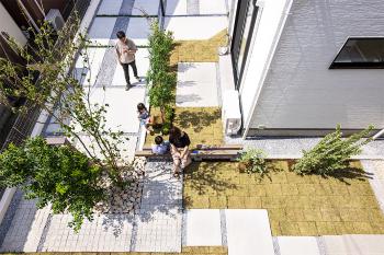 Houses Connected by a Shared Garden