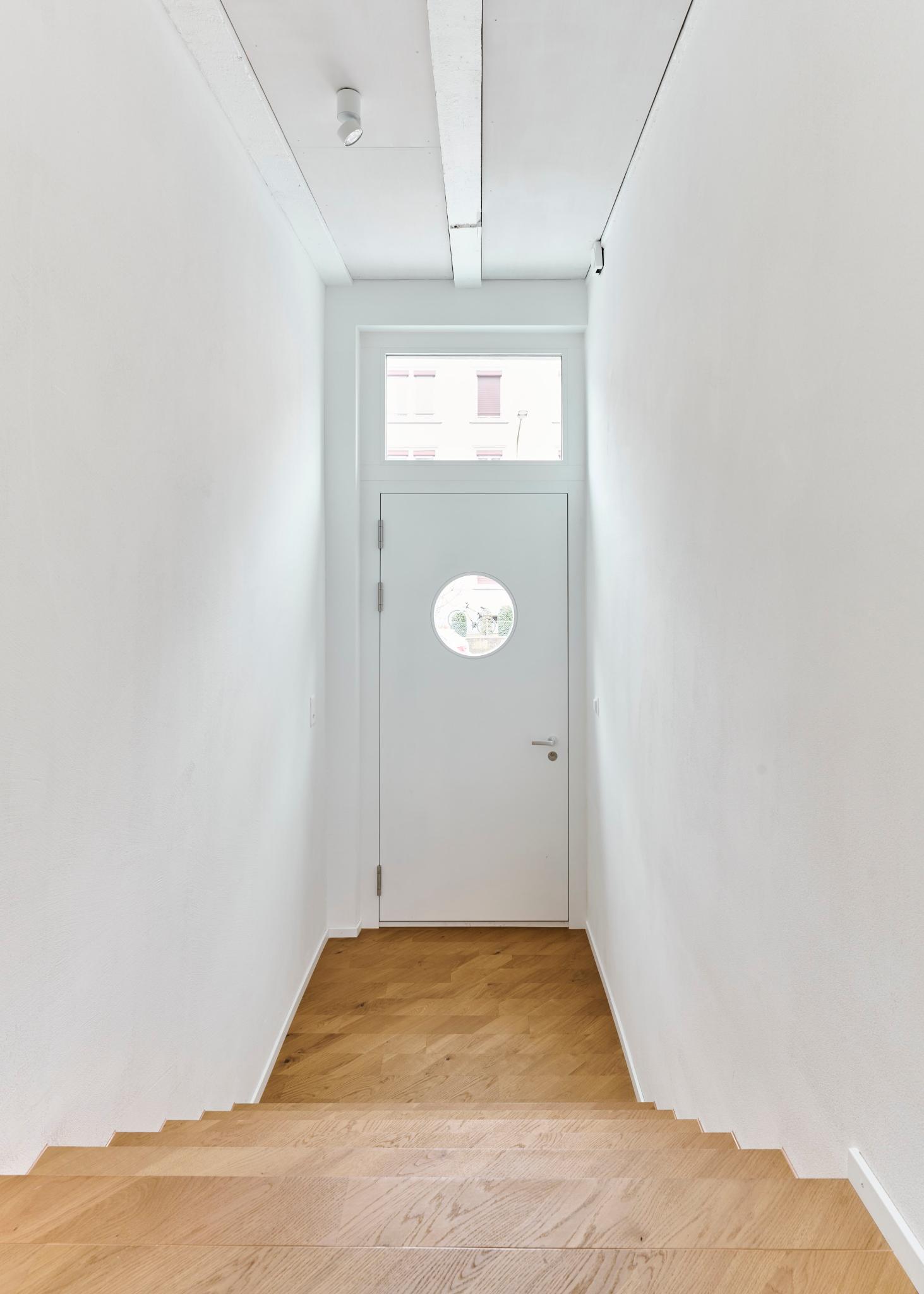 Building Within Existing Fabric: Row House Zurich