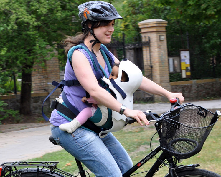 Riding a bike on sale with baby carrier