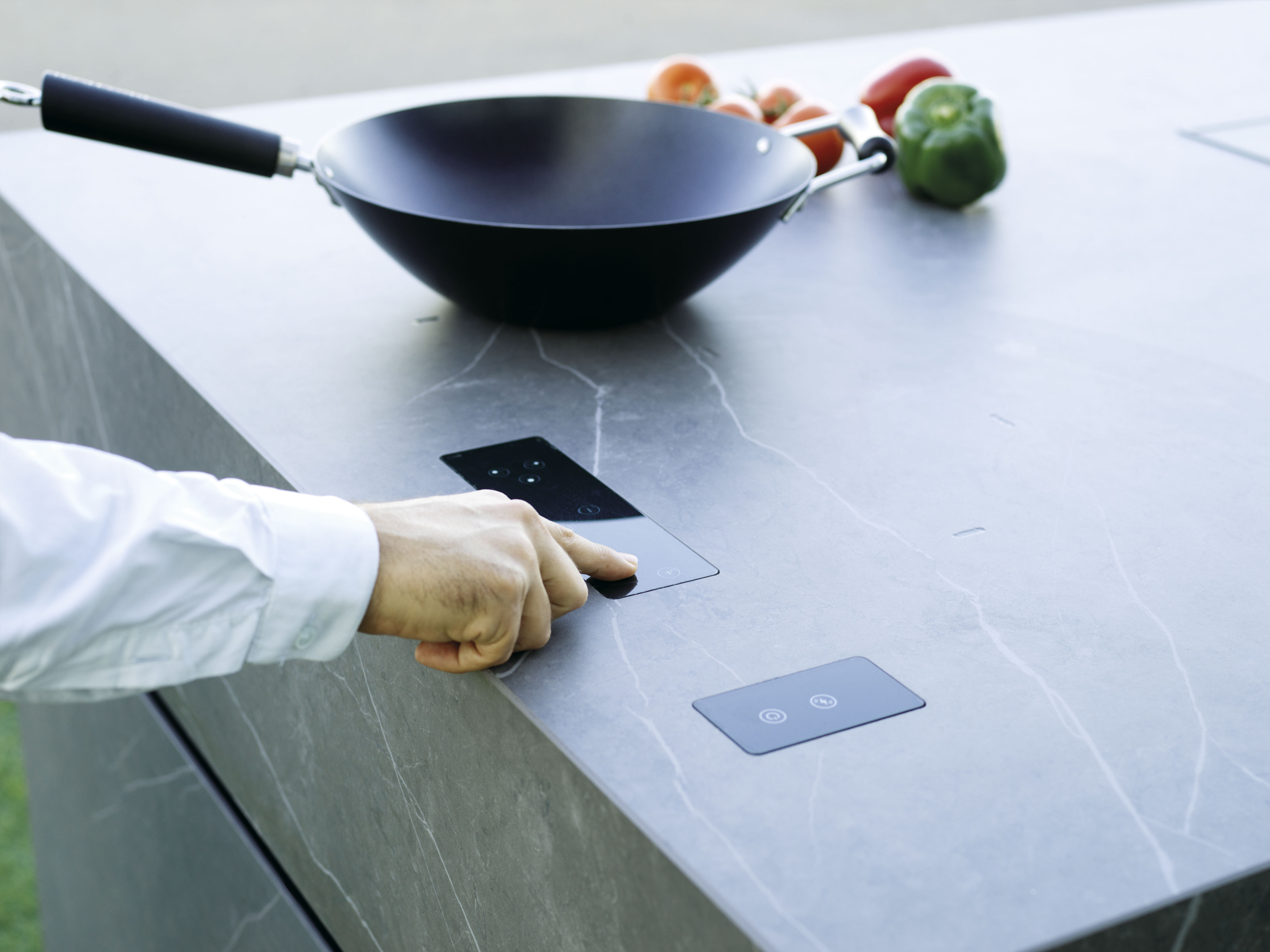 Invisible cooktop with dual inductive technology